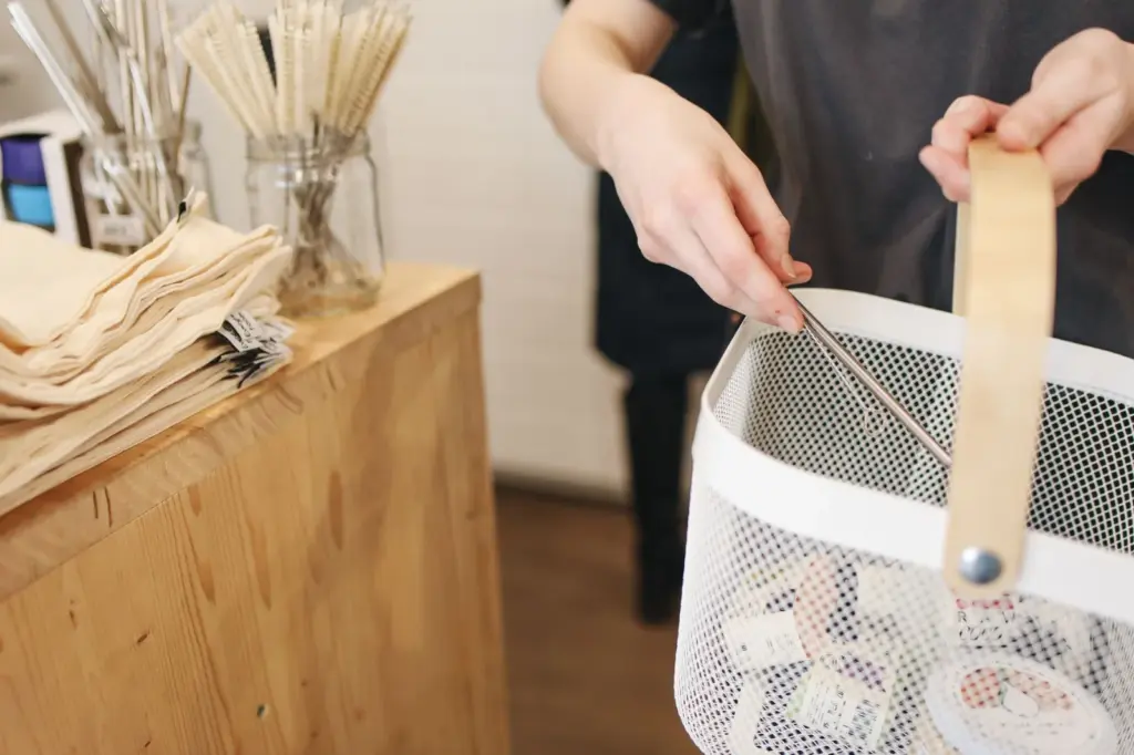 What Is a Zero Waste Lifestyle - Person shopping sustainably with a reusable basket in an eco-friendly store.